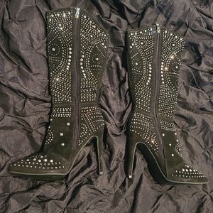Olivia Miller back with silver studded boots